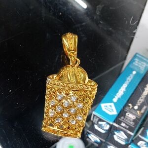 Elegant Gold Pendant with Crystals